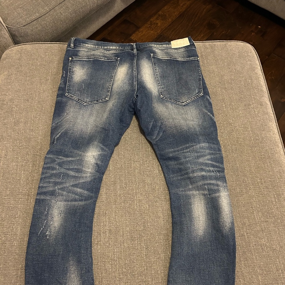 Blue Skinny Jeans with Distressed Details